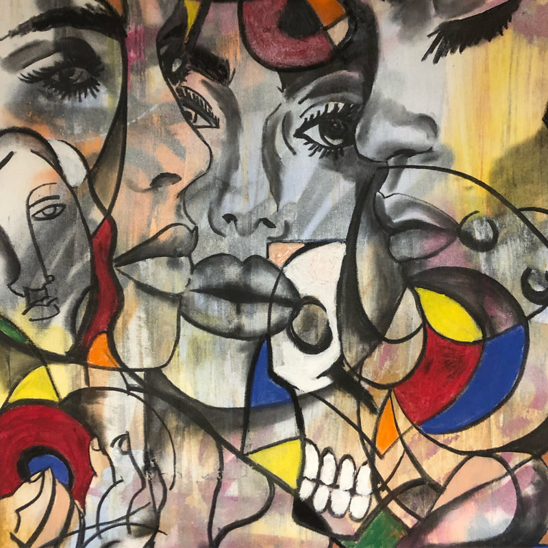 Abstract artwork with stylized faces and colorful shapes