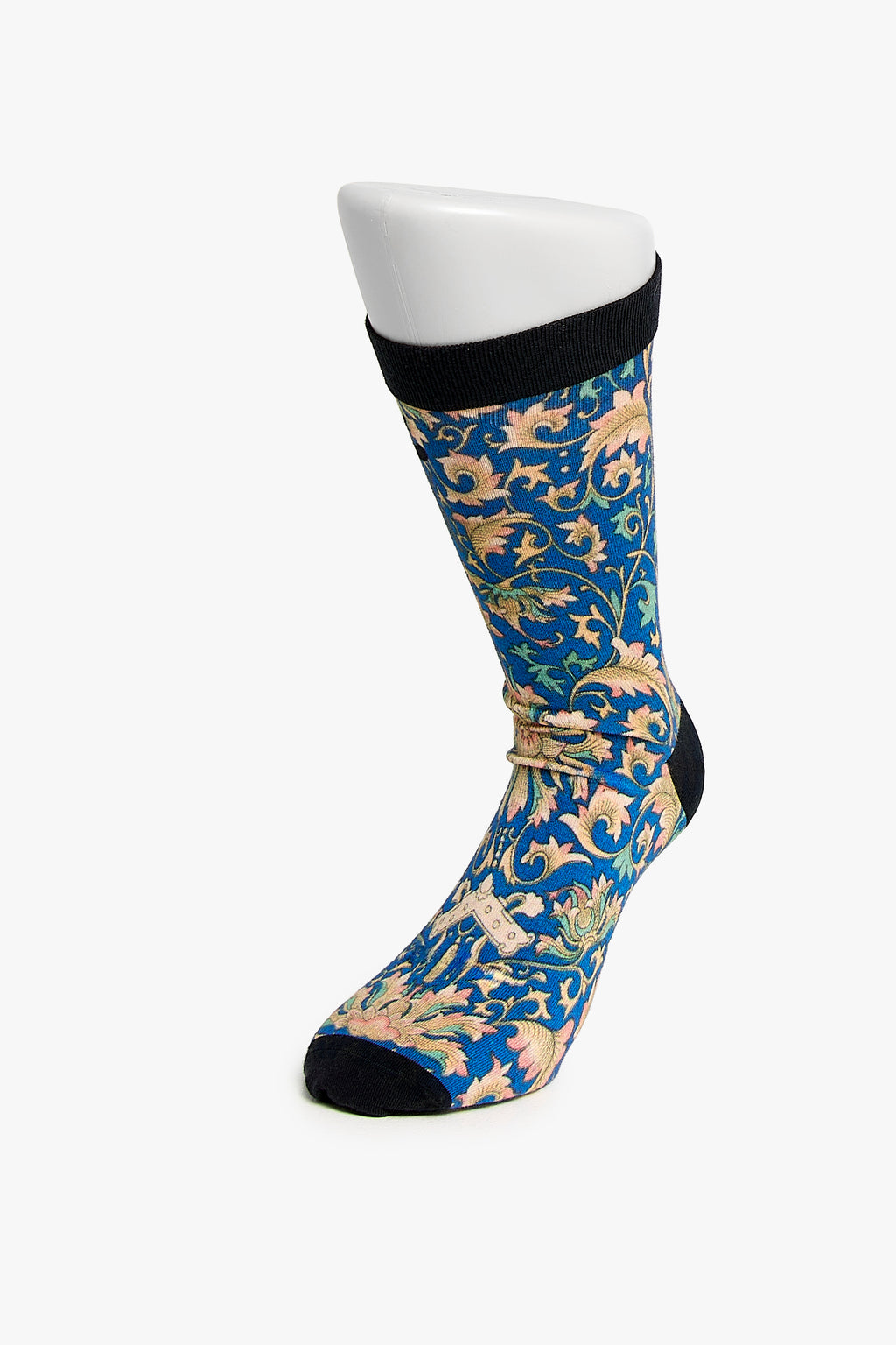 Blue and beige patterned sock on a white background
